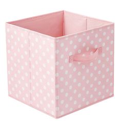 a pink and white polka dot storage bin