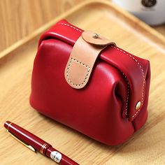 100% Hand-stitched claret-red Cow Leather Makeup bag Features: * Material: Vegetable Tanned Cowhide Leather * Size: 12.00cm*8.00cm*10.00cm * Color: Purplish Reddate Red(please let me know the color you want when you place the order) * 100% Handmade stitching If you have any questions or concerns, please don't hesitate to contact me. Red Shoulder Bag With Card Slots For Travel, Red Travel Shoulder Bag With Card Slots, Red Wallets With Mobile Phone Bag For Daily Use, Red Wallet With Mobile Phone Bag For Daily Use, Red Pouch Clutch With Card Slots, Red Everyday Bags With Card Slots, Red Clutch With Card Slots, Red Pouch With Card Slots For Daily Use, Red Pouch Wallets For Daily Use