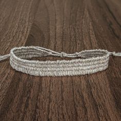 Simple handwoven minimalist bracelet made by using natural linen thread. Feel the texture of linen and enjoy its natural color. I am in love with linen, its elegant simplicity. Therefore, I have prepared for you collection of linen bracelets. The basis of absolutely all available bracelets is linen thread. But I want you to fully feel the texture of linen and enjoy its natural color. That's why I created completely linen, or in combination with cotton collection of bracelets for you. These handwoven products are a combination of old traditions with a modern vision. All bracelets are in limited quantities. Every bracelet is made with adjustable makrame slipknot closure in order to fit on any wrist. It is light and comfortable to wear. You can combine it with any other bracelets or different Handmade Minimalist Braided Bracelets For Everyday, Minimalist Handmade Braided Bracelets, Adjustable Hand Wrapped Natural Bracelets, Casual Woven Bracelet, Minimalist Handmade Braided Bracelets For Everyday, Adjustable Natural Color Bracelets For Everyday, Minimalist Braided Bracelet For Everyday Use, Adjustable Woven Braided Bracelet For Everyday, Natural Macrame Bracelet As A Gift