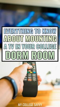 a person holding a remote control in their hand with the text everything to know about mounting a tv in your college dorm room