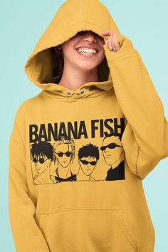 Unisex Banana Fish Hoodie, Anime Hoodie, Eiji Okumura, Ash Lynx, Manga, Anime aesthetic Sweatshirt, Manga girl shirt, kawaii clothing A unisex heavy blend hooded sweatshirt is relaxation itself. The material is a thick blend of cotton and polyester. This makes for a plush, soft feel alongside warmth. It's also a great surface for printing. There are no side seams. A spacious kangaroo pocket hangs in front. The hood's drawstring is the same color as the base sweater. .: 50% Cotton 50% Polyester . Fish Hoodie, Vaporwave Hoodie, Kawaii Hoodie, Anime Streetwear, Anime Sweatshirt, Funny Sweaters, Banana Fish, Anime Hoodie, Cute Shirt