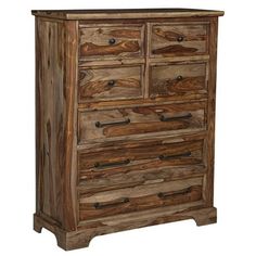 an old wooden dresser with drawers and knobs