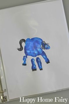 a card with an image of a blue horse on it's back and the words happy home fairy written below