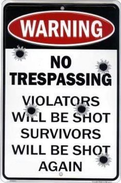 a warning sign that says no trespassing violators will be shot