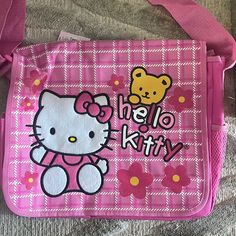 Hot Pink Hello Kitty / Sanrio Messenger Bag By Fab Starpoint Plaid Pattern With Fabric Flocked Hello Kitty And Cute Bear. Sides Have Storage Pouches Adjustable Strap Cheap Trendy Hello Kitty Shoulder Bag, Hot Pink Hello Kitty, Duffle Bag With Wheels, Hello Kitty Makeup Bag, Hello Kitty Bags, Kitty Aesthetic, Pink Duffle Bag, Cat Coin Purse, Kitty Pictures