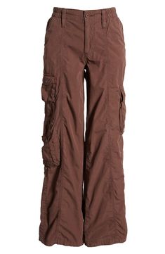 Tap into the retro look you missed the first time around in these all-cotton cargo pants featuring commodious bellows pockets to hold most everything you need. Exclusive retailer 31" inseam; 23 1/2" leg opening; 9 1/2" front rise; 13 1/2" back rise (size Medium) Back elastic waist 100% cotton Machine wash, line dry Made in Turkey Urban Outfitters Y2k, Brown Cargo Pants, The Comeback, Cotton Cargo Pants, Aesthetic Spring, Bdg Urban Outfitters, Spring Fits, Bellows, Cargo Pant