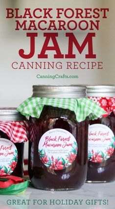 three jars of jam sitting on top of a table with the title black forest macaroon jam canning recipe