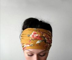 "This head scarf comes in a rich shade of ochre with a vintage floral print. The fabric is a medium weight jersey knit with a minimal amount of stretch to it. Incredibly easy to style, stays put all day long, and adjusts to any head size. Hand sewn with a double layer and perfectly finished with a clean blind stitch. The Details: - Length - approximately 65\" - Width - approximately 6\" - Color - ochre floral - Material - Jersey blend - Hand wash cold, hang dry If you're new to EcoShag head scar Dark Mustard Yellow, Extra Wide Headband, Dread Locks, Jersey Scarf, Blind Stitch, Cotton Headband, Yoga Headband, Tie Headband, Fabric Headbands