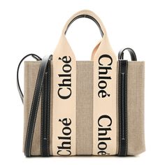 This is an authentic CHLOE Cotton Calfskin Small Woody Ribbon Tote in White and Black. This chic tote is crafted of ivory canvas with black leather trim and features Chloe logos along the midline straps and an adjustable strap with light gold hardware. The top is open to a beige fabric interior with a patch pocket. Chloe Logo, Beige Fabric, Leather Trim, Leather Trims, Gold Hardware, Patch Pocket, Calf Skin, Chloe, White Black