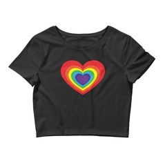 Cute LGBT pride crop top with rainbow flag heart design across the chest. Trendy style gay pride top for LGBTQ+ pride events, summer festivals and vacations. This tee shirt is cropped short and the hem sits below the bust and above the navel. It has a form hugging fit. 💗 Please check the size guide before purchasing.STYLE GUIDE• Tight & form fitting• Cropped short• Side seamsMATERIAL52% combed and ring-spun cotton/48% polyester Pride Wear, Summer Festivals, Pride Outfit, Rainbow Flag, Lgbtq Pride, Cropped Tee, Lgbt Pride, Pride Shirts, Summer Festival