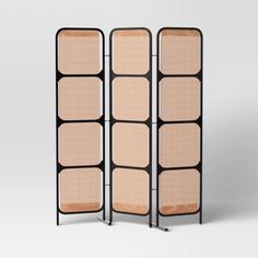 a room divider with four panels on each side