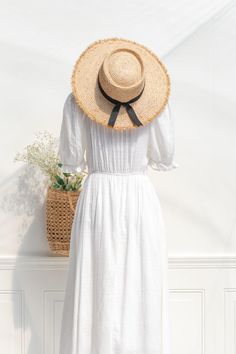 Unique and lovely, the Village Market sun hat is made from lightweight finely woven raffia with a narrow black ribbon at the brim. Inspired by spring and summer walks in the South of France. Please Note- This item is final sale only. . Details: 15" Total Diameter 23" Around Crown with Inner Adjustable Ribbon Material: Woven Raffia Imported Summer Picnic Boater Hat In Toquilla Straw, Spring Brimmed Boater Hat For Picnic, Spring Picnic Brimmed Boater Hat, Spring Summer Boater Hat For Picnic, Summer Boater Hat For Spring Picnic, Summer Woven Straw Hat For Kentucky Derby, Spring Panama Hat For Picnic With Flat Brim, Woven Boater Hat For Day Out, Wide Brim Boater Hat For Kentucky Derby Picnic