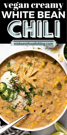 vegan creamy white bean chili in a bowl with tortilla chips and cilantro