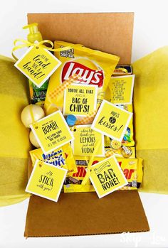 a box filled with lots of yellow items