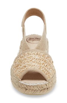 An easygoing espadrille-style sandal brings boho-chic vibes to your dress-up game with eye-catching braiding atop a comfortable, walkable heel. Textile upper and lining/synthetic sole Made in Spain Casual Braided Sandals In Natural Color, Bohemian Wedge Sandals With Round Toe For Spring, Natural Wedge Sandals With Woven Sole For Summer, Casual Braided Sandals For Vacation, Casual Braided Sandals For Summer, Natural Espadrille Wedge Sandals For The Beach, Straw Espadrilles With Woven Sole For Summer Outings, Casual Beach Sandals With Rope Detail, Casual Beach Sandals With Braided Trim