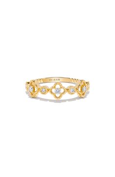 A dainty 14-karat gold ring showcases sparkly round-cut diamonds nestled within milgrain quatrefoils and bezel settings for elegant shine. Total diamond weight: 0.16ct. Color: G–H Clarity: SI1 14k gold/diamond Imported Diamond Guide Clover Ring, Diamond Guide, Keep Jewelry, Round Cut Diamond, Womens Jewelry Rings, Bezel Setting, Rings Statement, Gold Ring, Round Cut