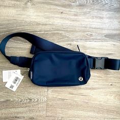 Brand New Lululemon Everywhere Belt Bag/ Fanny Pack Sold Out From Lululemon Color Is True Navy Lululemon Logo On Front Is Metal Brand New With Tags Attached Can Be Worn Cross Body Or Around Waist Capacity Is 1 L Sporty Blue Belt Bag For Everyday, Sporty Blue Belt Bag, Navy Lululemon, Preppy Accessories, Camo Bag, Lululemon Bags, Lululemon Everywhere Belt Bag, Everywhere Belt Bag, Birthday Stuff