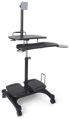 a computer desk sitting on top of a black stand with wheels and two trays