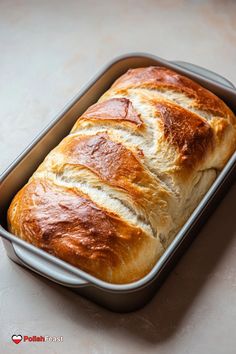 a loaf of bread in a pan on a table