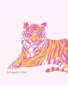 an orange and pink tiger laying down on the ground