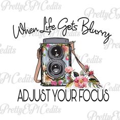 a camera with the words when life gets blury, adjust your focus on it