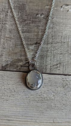 This Elegant Sterling Silver and Agate Necklace is a unique statement piece that you will definitely want to add to your jewelry collection! Handcrafted with care, each component is thoughtfully chosen and expertly assembled, resulting in a piece of jewelry that is as unique as it is beautiful. This necklace features a stunning agate that was selected for its beauty and it's unique inclusions. The organic beauty of the agate is complemented by the simple sterling silver bezel setting which is me White Agate Round Pendant Jewelry, Agate Round Pendant Jewelry Gift, Agate Round Pendant Jewelry For Gift, Handmade Oval Pendant Jewelry For Everyday, Handmade Everyday Jewelry With Oval Pendant, Handmade Everyday Oval Pendant Jewelry, Agate Round Pendant For Jewelry Making, Spiritual Agate Teardrop Pendant Jewelry, One Of A Kind Teardrop Agate Jewelry