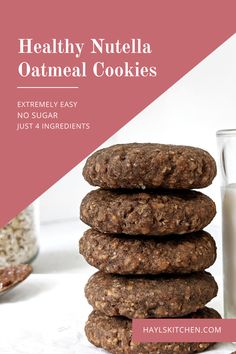 healthy nutella oatmeal cookies stacked on top of each other next to a glass of milk