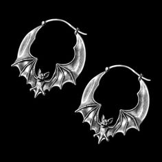 Elevate your style with the perfect blend of elegance and edge with our Flying Bat Hoop Earrings. These chic and charming earrings feature a captivating flying bat design, adding a touch of spooky flair to any outfit. Crafted in a sleek silver finish, they are approximately 1" in diameter, making them an ideal statement piece without being overpowering. The unique and secure bar-and-clasp closure ensures these earrings are suitable for both gauged and non-gauged piercings, offering a comfortable Bat Jewelry, Gothic Chic, Bat Earrings, Alternative Jewelry, Septum Jewelry, Funky Jewelry, Coven, Jewelry Inspo, Pretty Jewellery