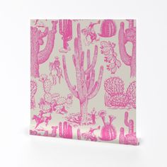 a pink and white paper bag with cactus designs on it