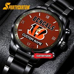 NFL Cincinnati Bengals Watch Custom Football Black Fashion Watch For Fans Introducing our Black Stainless Steel Watch, a symbol of sophistication and durability. Crafted with precision, its sleek black stainless steel case and strap offer a modern aesthetic. With precise quartz movement and scratch-resistant glass, it ensures reliability and style. Elevate your wrist game with [...] Business Watch Accessories In Stainless Steel, Black Digital Watch For Business, Black Digital Watch With Round Dial For Business, Wear-resistant Stainless Steel Watch, Black Digital Watch For Business With Round Dial, Wear-resistant Stainless Steel Watch With Round Dial, Modern Black Stainless Steel Chronograph Watch, Black Business Watch With Stainless Steel Clasp, Modern Wear-resistant Stainless Steel Watch Accessories