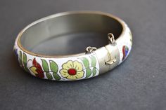 vintage enamel bracelet thailand Traditional White Metal Bracelet, Collectible Enamel Bracelet Jewelry, White Enamel Bangle Jewelry, Unique White Enamel Jewelry, Antique Enamel Bracelet Collectible, Antique Enamel Bracelets For Gifts, Vintage Handmade White Cuff Bracelet, Vintage Inlay Bracelets For Gifts, Antique Enamel Bracelets As Gift