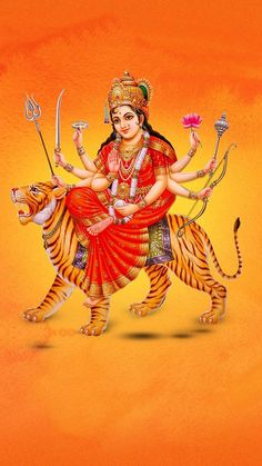 the hindu goddess sitting on top of a tiger with two swords in her hand and an orange background