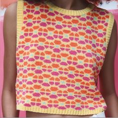 Retro Sleeveless Floral Jacquard Knit Sweater Vest Top - Yellow, Orange & Pink No Size: Fits Like S/M No Brand, Looks Just Like The Sweater Vest From Zara! Vibrant Retro Yellow, Orange, Pink, And Blue Retro Floral Print, 60s Or 70s Vibe. Sleeveless W/ Round Neck. Cropped Relaxed Fit Style. Soft Knit, 25% Nylon, 40% Acrylic & 35% Polyester Good Condition, New, Never Worn. No Flaws, Holes Or Stains. First Picture Is A Stock Photos, Photos Of The Actual Item After. Jacquard Knit Sleeveless Vest, Casual Jacquard Knit Sleeveless Sweater Vest, Casual Jacquard Knit Sleeveless Top, Retro Jacquard Knit Tops For Spring, Yellow Sleeveless Vest For Fall, Casual Jacquard Knit Vest, Spring Jacquard Knit Sweater Vest, Sleeveless Yellow Sweater Vest For Fall, Yellow Sleeveless Sweater Vest For Spring