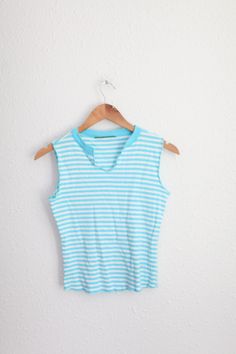 "material: jersey cotton blend fits like: omens small/medium pit to pit:15\" length:220\" shoulders:14\" gently used vintage condition" Cheap Vintage Striped Tops, Sleeveless Cotton Tank Top With Contrast Stripes, Cotton Sleeveless Tank Top With Contrast Stripes, Fitted Blue Top With Contrast Stripes, Fitted Sleeveless Top With Contrast Stripes, Striped Cotton Tank Top, Striped Sleeveless Cotton Top, Blue Three Stripes Tops For Summer, Summer Striped Cotton Vest