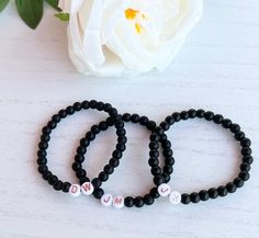 Black Beaded Initial Bracelet -JM,DW,JK ❋ Listing is for one Black Beaded Bracelet with initials on an elastic cord ❋ Rose Gold Letter Beads ❋ Round Black Glass Beads ❋ One size fits most  ❋ Colors may vary due to lighting ☆ Perfect for wearing alone or stacking with our other beaded bracelets  ☆ Make sure to pick the correct initials for your Favorite Guy  ❤️Care Tips❤️ ❋ Best to keep away from water and direct sunlight  ❋ Materials can be fragile if dropped or if band is stretched  ❋ Please ro Bracelet With Initials, Initial Bracelets, Black Beaded Bracelet, Bracelets Black, Jewelry Rose Gold, Jordans Girls, Bracelet Initial, Black Beaded Bracelets, Initial Bracelet