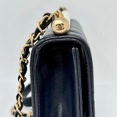 Chanel 2019 Quilted Small Chic Pearl Flap Bag with Interlocking CC Turn-lock and Gold-tone Hardware (with Dustbag) Designer = Chanel Color = Black Material = Leather Condition = Very Good Height = 6 Width = 8.5 Depth = 1.5 Class = Premier Location: Chicago Item Number: 19740-126 Item ID: 298142 Category: Shoulder Bag Timeless Black Flap Bag With Turn-lock Closure, Classic Black Bag With Turn-lock Closure, Classic Black Bags With Turn-lock Closure, Luxury Black Flap Bag With Turn-lock Closure, High-end Black Bag With Turn-lock Closure, Classic Crossbody Bag With Lock, Designer Black Flap Bag With Turn-lock Closure, Classic Double Flap Bag With Branded Hardware, Classic Double Flap Shoulder Bag With Branded Hardware