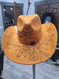 Custom hand burned hat.  Design your perfect cowgirl hat. Choose color, design,  head band and feathers.  You'll love it! And no one else will have a hat exactly like yours. Wood Burned Felt Hat, Hand Painted Western Hat Bands For Rodeo, Hand Painted Western Hat Bands For Festival, Western Hand Painted Hats For Country Events, Western Style Hand Painted Hat Bands For Country Events, Hand Painted Adjustable Western Hat, Adjustable Hand Painted Western Hat, Western Hand Painted Fedora For Country Events, Burned Hat Design