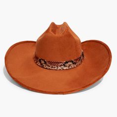 Burnt Orange Cowboy Hat by AB.LINO Western meets contemporary. Our take on a western classic, made from the same materials used on our flagship rancher hat. Trimmed with a Snakeskin Hat Band. Made from stiffened Mexican suede Spot / specialist clean Brim width: 4″ / 10.16 cm Crown height: 4″ – 4.75″ Rigid crown design Please note: due to the color and nature of the suede dyeing process, some flecking or marks may be present in material Brown Felt Hat For Rodeo And Kentucky Derby, Brown Felt Hat For Kentucky Derby And Rodeo, Western Style Brown Hat With Flat Crown, Southwestern Fedora Felt Hat For Rodeo, Southwestern Style Felt Fedora For Rodeo, Southwestern Wide Brim Felt Hat For Rodeo, Southwestern Style Wide Brim Felt Hat For Rodeo, Western Brown Fedora With Flat Crown, Western Style Brown Fedora With Flat Crown