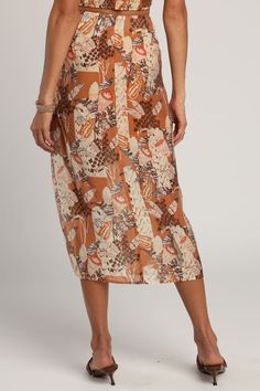 Brown Midi Skirt - Multi Print Skirt - Twist-Front Skirt - Lulus Beach Wrap Skirt Relaxed Fit, Flowy Wrap Skirt For Beachwear In Spring, Relaxed Midi Skirt For Vacation, Brown Midi Skirt For Spring, Relaxed Midi Beach Skirt, Midi Pleated Skirt Bottoms For Vacation, Beach Midi Skirt Relaxed Fit, Relaxed Midi Skirt For Beach, Beach Pencil Skirt With Lining