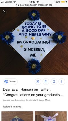 the graduation cap has been decorated with blue flowers