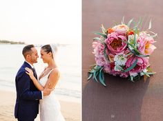 a bride and groom standing on the beach next to their wedding bouquet in front of the ocean