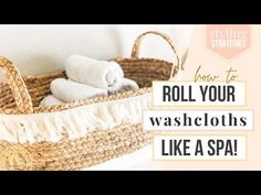 a basket that has towels in it and the words roll your washcloths like a spa