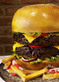 a cheeseburger and fries are on a plate