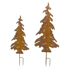 two metal christmas trees sitting next to each other on top of a white background,