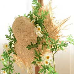 Handcrafted natural straw hat with silk-like flowers and vines, spring-like daisies and green leaves complement each other to enhance the authenticity.(This product needs to be compressed and transported with artificial flowers and straw hats. After unpacking, you can refer to the pictures to organize and restore them. Due to the blooming conditions of the artificial flowers, the height and width of the product may vary slightly.) Bohemian Natural Straw Hat For Garden Party, Woven Sun Hat For Spring Garden Party, Spring Woven Hats For Garden Party, Woven Hat For Spring Garden Party, Eco-friendly Woven Sun Hat For Spring, Bohemian Palm Leaf Straw Hat For Spring, Bohemian Straw Hat For Garden Party, Spring Festival Palm Leaf Hats, Bohemian Style Palm Leaf Sun Hat For Spring