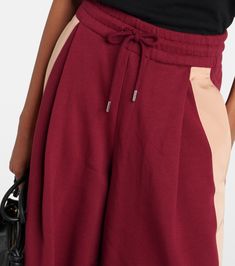 Cotton jersey sweatpants in red - Dries Van Noten | Mytheresa Burgundy Cotton Wide Leg Pants, Sporty Cotton Wide Leg Pants With Ribbed Waistband, Casual Burgundy Cotton Pants, Casual Burgundy Bottoms For Streetwear, Alexander Mcqueen Clothing, Sophie Bille Brahe, Bridal Bag, Red Accessories, Rings Jewelry Fashion