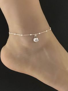 "Sterling Silver Soccer Ball Anklet Minimalist and Dainty Beaded Soccer Mom Anklet ANKLET FEATURES: Metal: All components are made from solid .925 Sterling Silver Model is wearing 10\" in length solid .925 Sterling Silver Bead Chain Chain Length: 9 inch + 1 inch extension Your Dainty Beaded Soccer Ball Anklet will arrive in a gift box, beautifully wrapped and ready for gifting Please send me a message if you have any questions before or after placing your order. Please also view my policy before