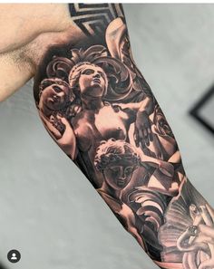 a man's arm with an angel tattoo on it and some other angels in the background