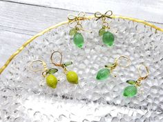 "glass Lime drop earrings with cute white flower and green leaf Material: glass Lime, arcylic leaf and flower, gold plated stud or hook drop length: about 1.25-1.5\" Contains small parts. Use caution when giving to young children less than Age 3 Please keep them away from moisture. If you have any questions, please feel free to contact me. Thanks :)" Gift Green Earrings With Fruit Design, Green Fruit Design Earrings For Gifts, Green Fruit Design Earrings Gift, Green Fruit Design Earrings As Gift, Green Dangle Earrings With Fruit Design, Green Drop Earrings With Fruit Design, Earrings Food, Food Earrings, Fruit Earrings