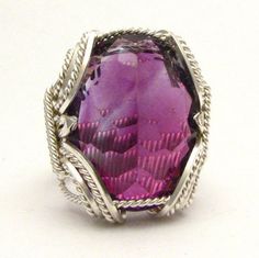 "Bold Handmade Sterling Silver Wire Wrapped Genuine Amethyst Ring Stunning Deep Purple Birthstone for February Sizing and shipping is ALWAYS FREE with a 14 day \"No Questions Asked\" return policy. lifetime warranty, free sizing and cleaning for life for life. All these are explained in the description below or feel free to reach out to us. Gemstone sizes available: S (18x13mm 3/4x1/2 inch 10+ct) This ring is made with real gems. I made it myself, so if you see a setting you like and want a diff Formal Amethyst Jewelry With Large Stone, Formal Large Stone Amethyst Jewelry, Handmade Fine Jewelry Amethyst Gemstones, Handmade Fine Amethyst Gemstones, Handmade Amethyst Fine Jewelry, Amethyst Crystal Ring With Gemstone Accents For Gift, Gift White Gold Amethyst Ring With Gemstone Accents, White Gold Amethyst Ring With Gemstone Accents For Gift, Unique Purple Crystal Wedding Ring